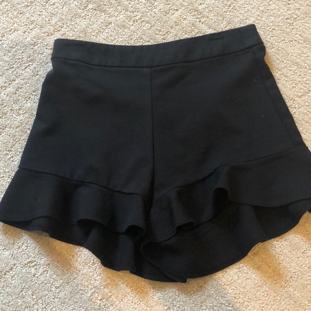 Black ruffled shorts